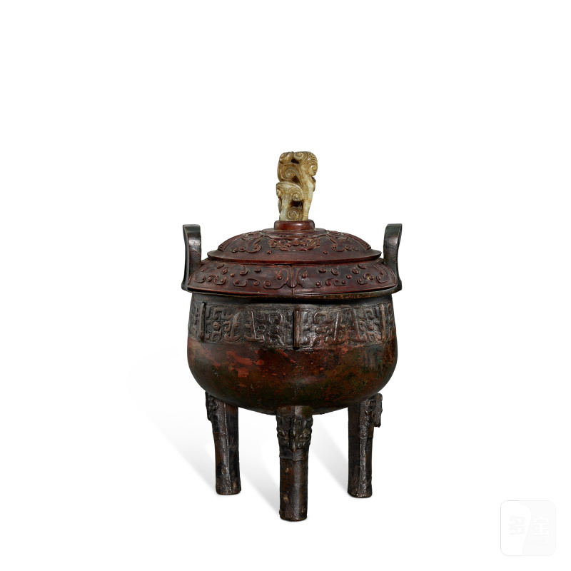 An archaic bronze 'mask' ritual food vessel, ding, Western Zhou dynasty | 西周 青銅獸面紋鼎